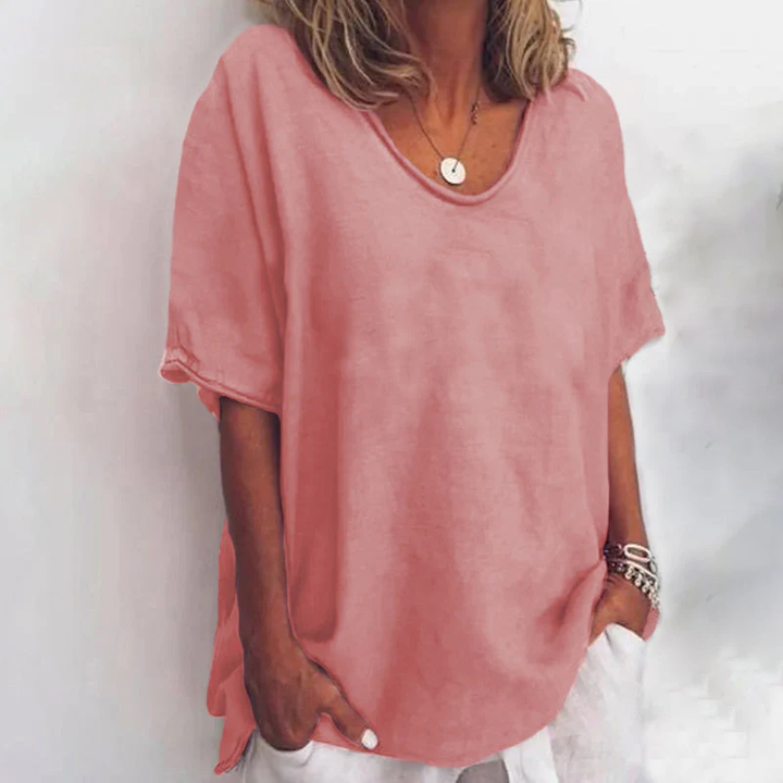 Breathable lightweight top with model details on a clean background, highlighting smooth flow.
