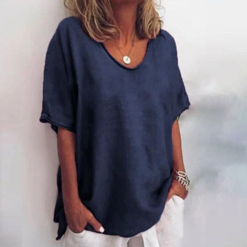 Flattering casual blouse with model details on a plain background, perfect for versatile styling.