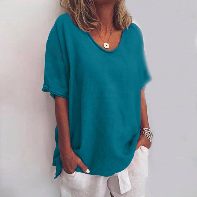 Chic relaxed blouse with model details on a plain background, designed for all-day comfort.