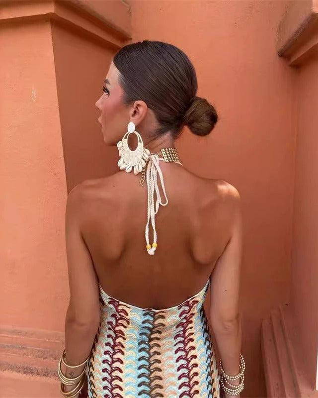 Women’s boho tunic dress with relaxed fit and coastal-inspired crochet texture, back view angle