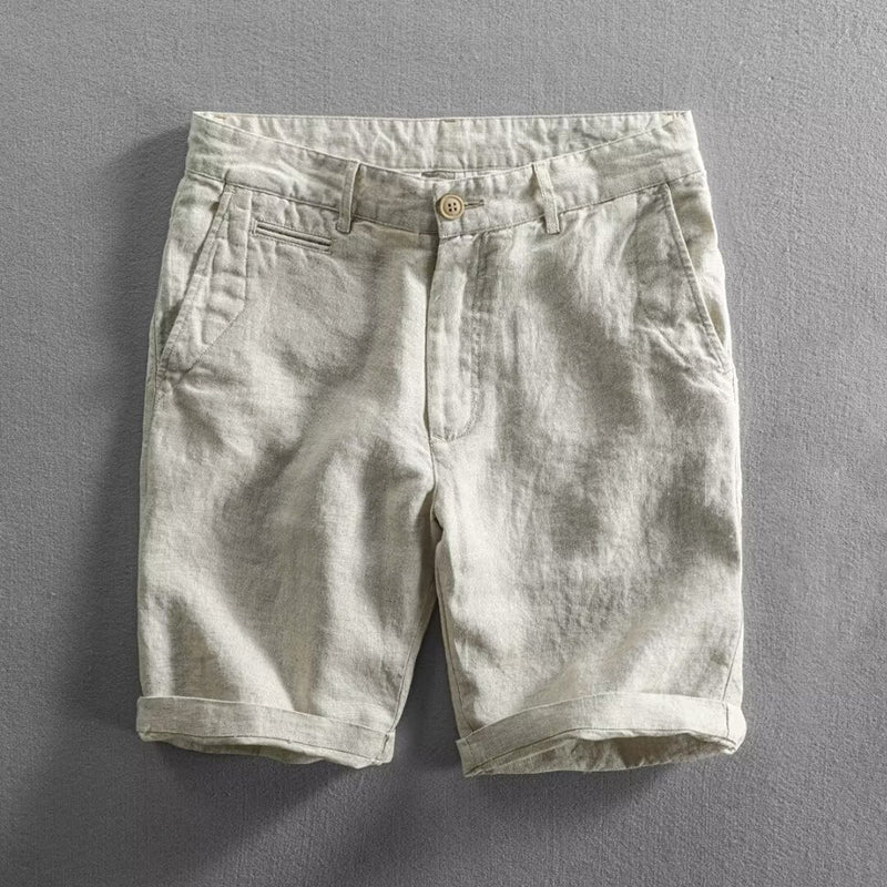 A lightweight everyday shorts with pockets on a plain background.