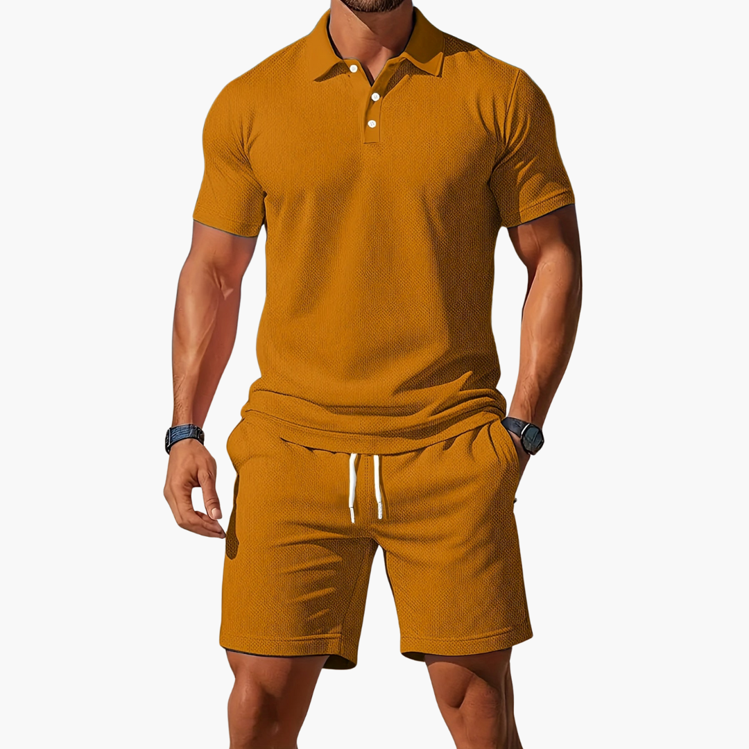 A model presents a casual men’s matching set with drawstring waist shorts on a plain background.