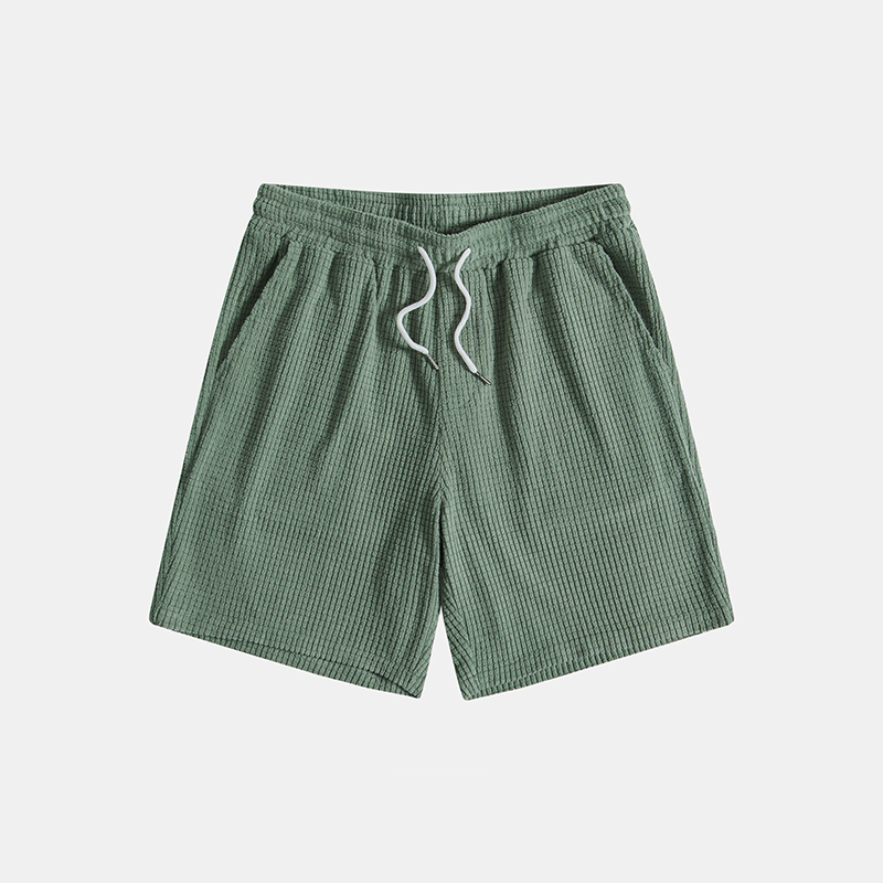 A matching short sleeve shirt and pull-on shorts set against a plain background.