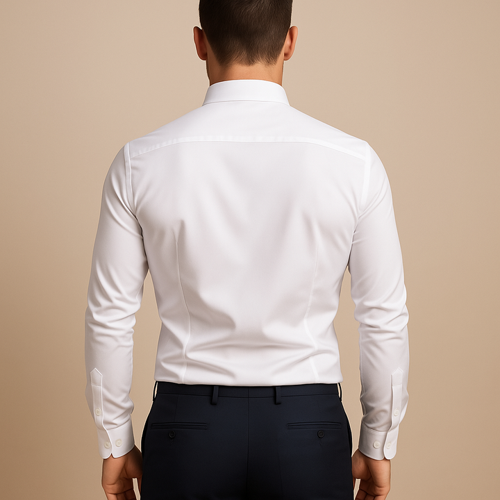 A tailored long-sleeve dress shirt featuring contrast collar details on a plain background.