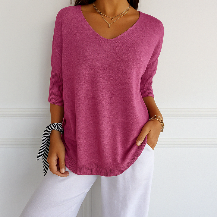 Plain background image of tailored knit top 