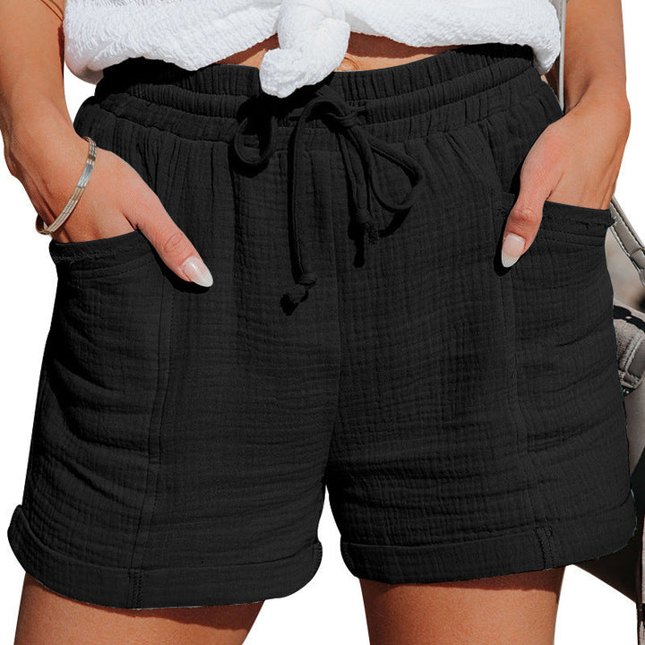 Casual elastic waist women’s shorts designed for warm weather comfort on a plain background.