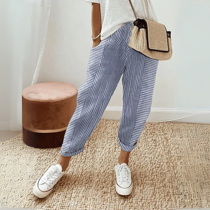 Striped wide leg pants displayed on a plain background for a clean product view.