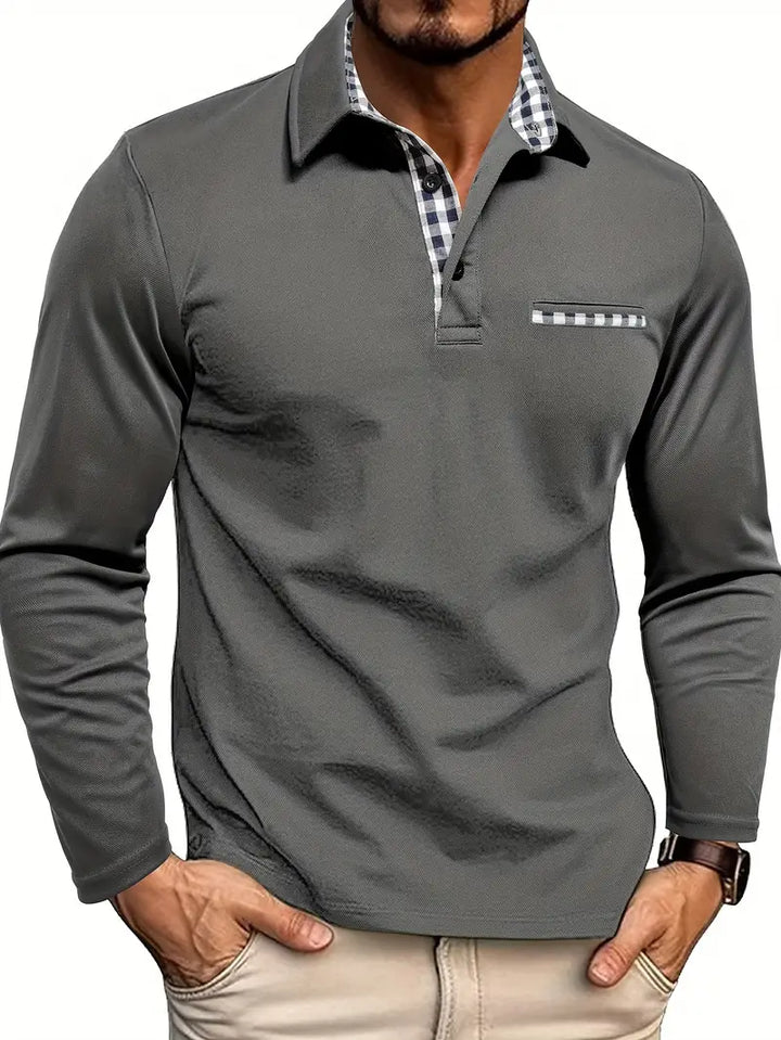 Male model wearing a long sleeve polo shirt on a plain background.