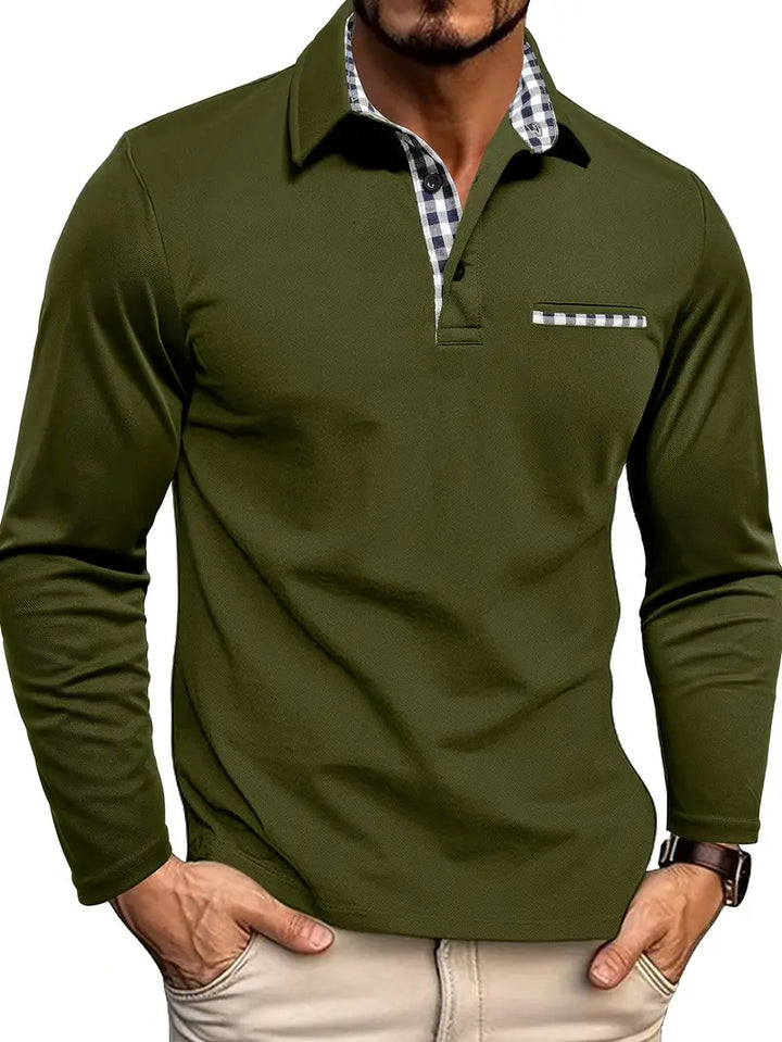  Male model wearing a button placket long sleeve polo shirt on a plain background.
