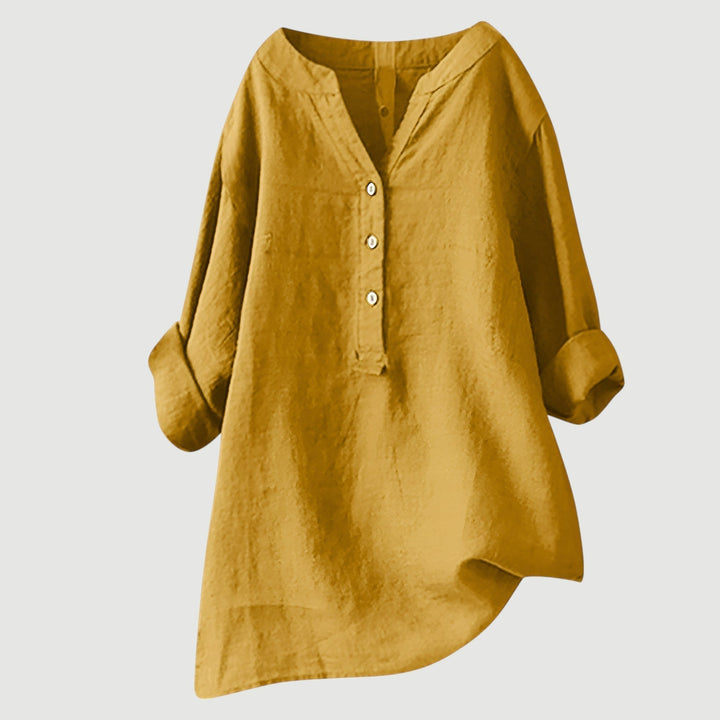 Lightweight button tunic for women shown with a simple plain background.
