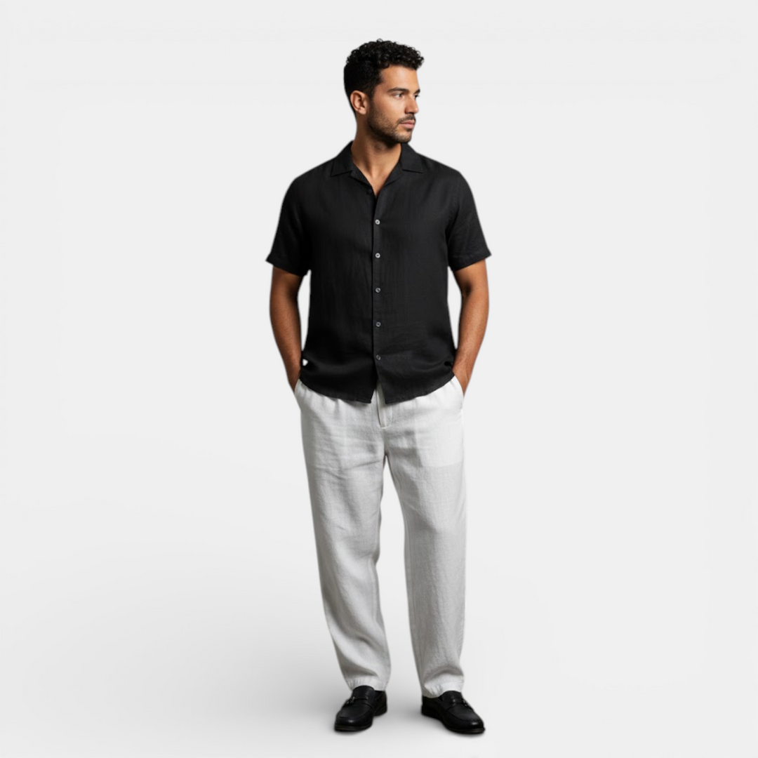  Model wearing a clean short sleeve shirt with a plain background.