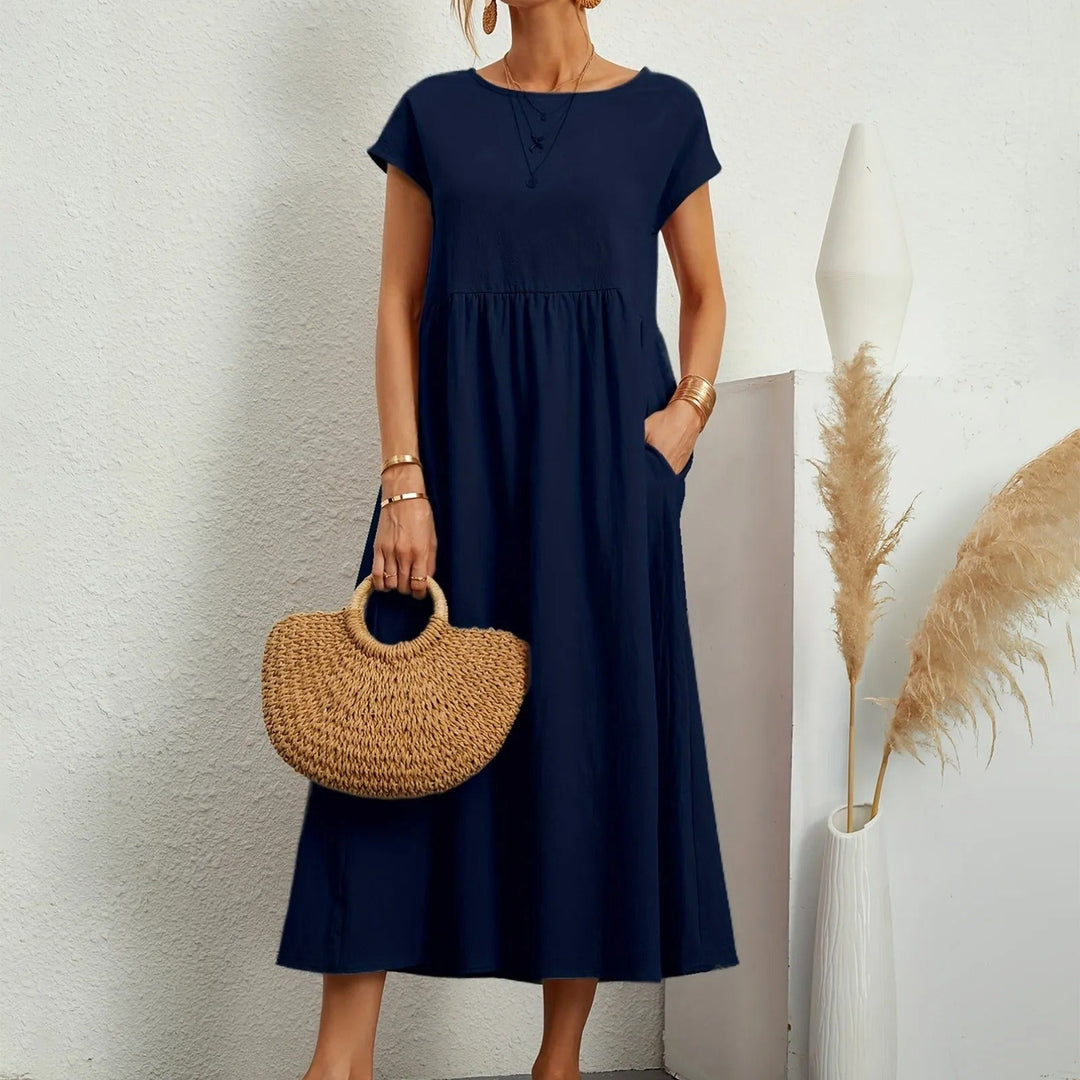 Refined women’s dress with graceful draping and a comfortable relaxed fit.