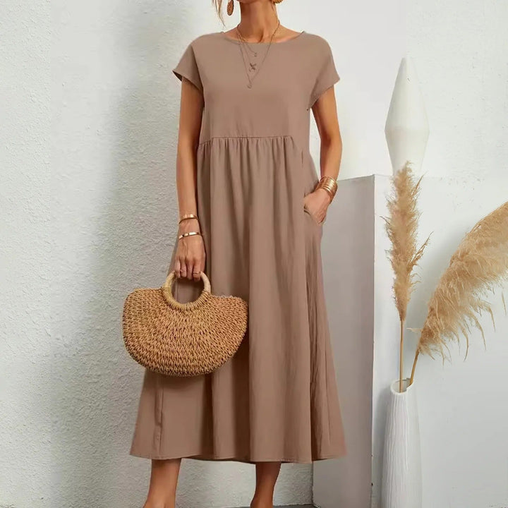 Classy dress with soft fabric, elegant shape, and effortless movement.