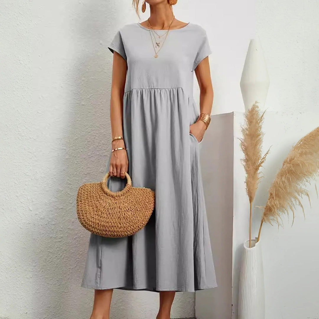 Chic dress with an elegant neckline and softly contoured silhouette