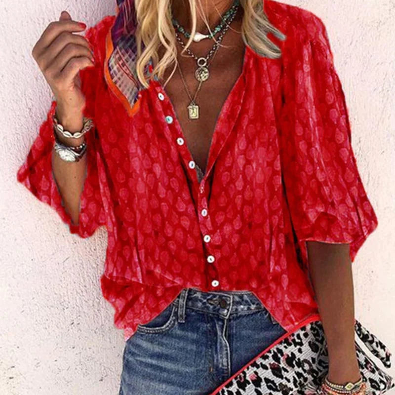 Hanging summer blouse with smooth fabric on minimal background setting