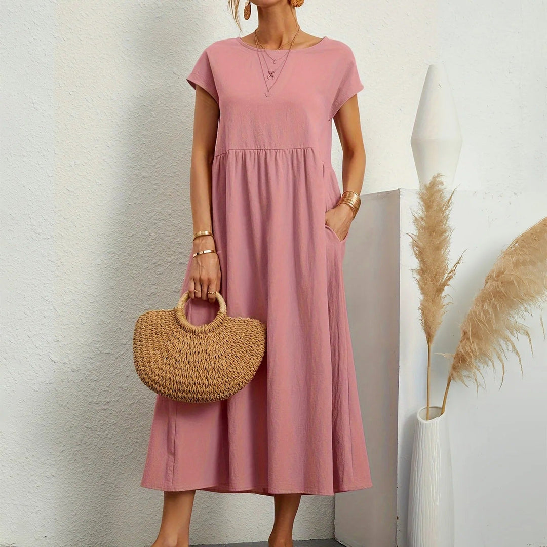 Beautiful women’s dress with a flattering shape and sophisticated details.