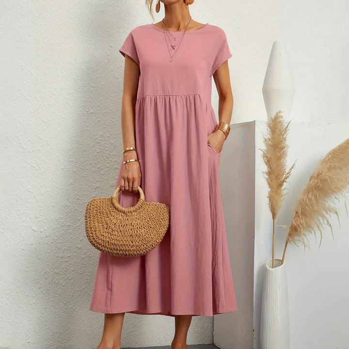 Beautiful women’s dress with a flattering shape and sophisticated details.