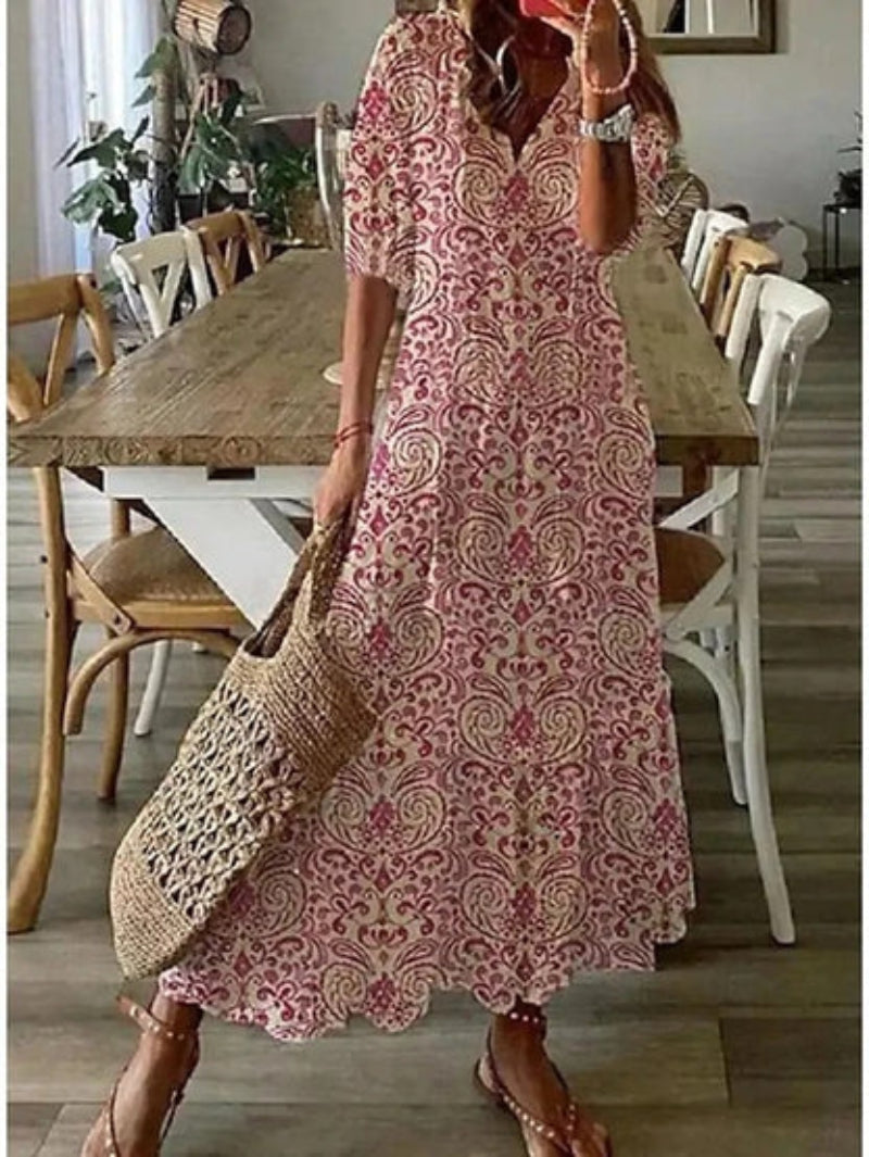 Casual printed maxi dress styled with boho charm and relaxed movement.