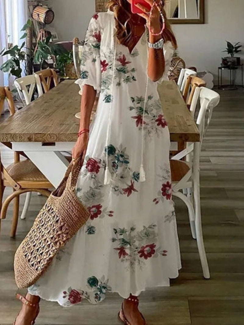 A flowing printed dress designed for easy everyday styling.