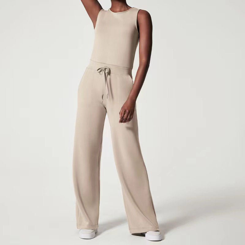 Women’s stylish jumpsuit shown on a plain background with a flattering waist and polished silhouette.