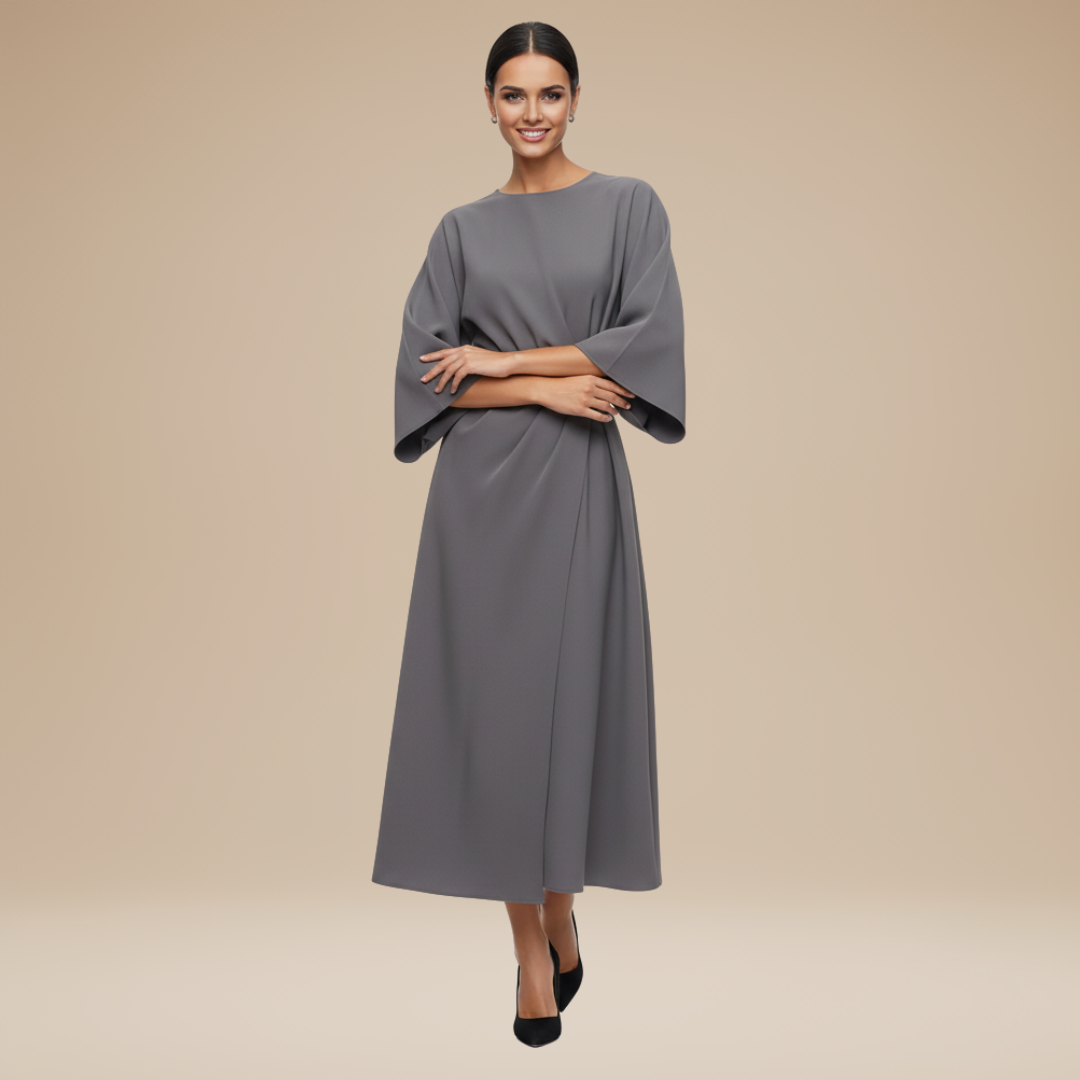 Model displaying a wrap-style midi dress with flowing sleeves on a plain background.