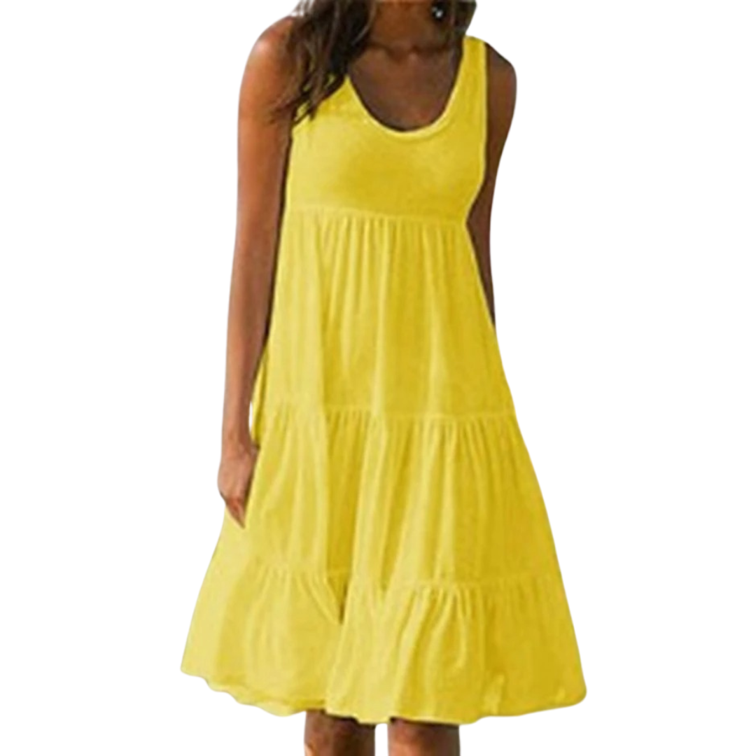 Sleeveless tiered midi dress displayed on a plain background with a flowy silhouette.