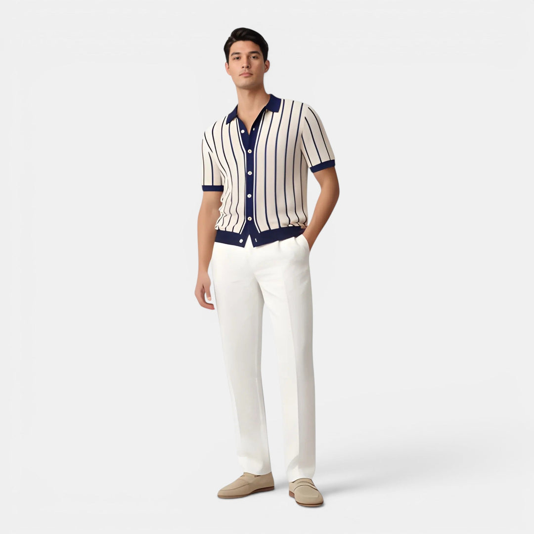  Man styled in a lightweight striped polo shirt on a plain background.
