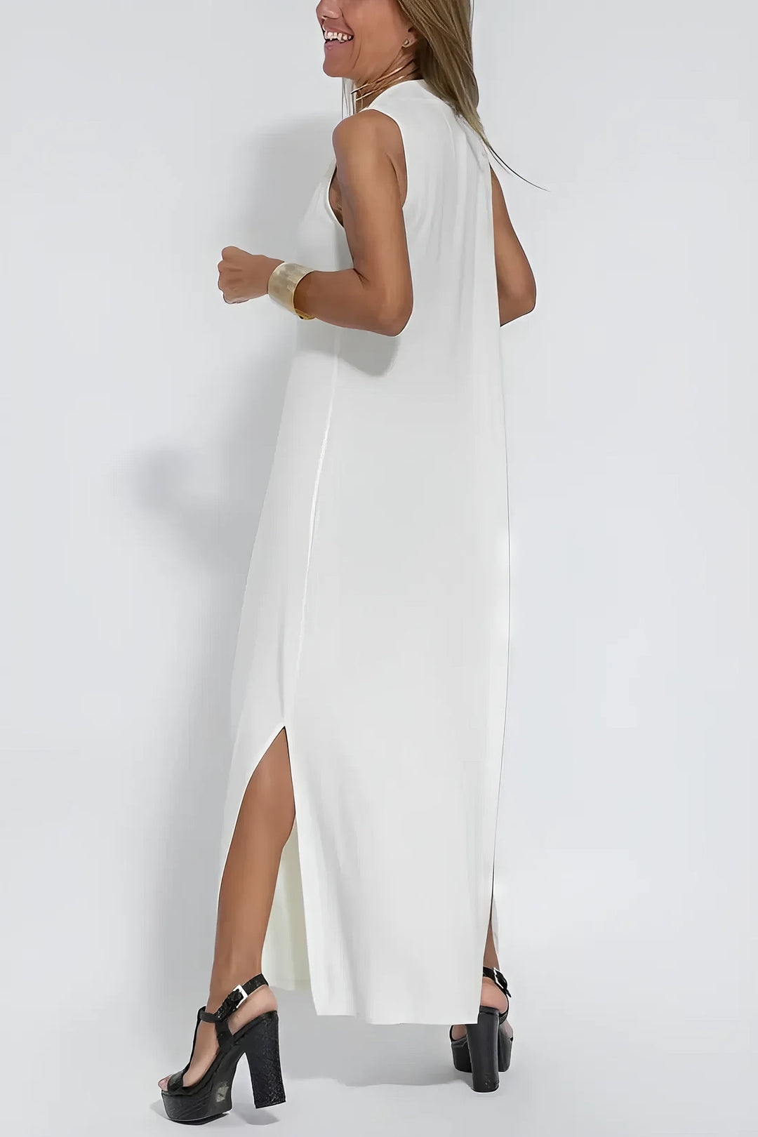 Elegant full-length dress w/ model on a clean background, designed for confident comfort, back angle